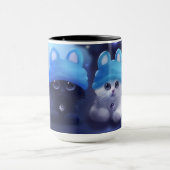Tasse mit zwei Katzen auf ihr (Zentrum)