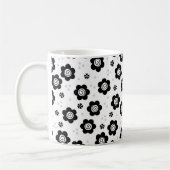 Tasse niedlicher Schwarz-weißer Blume (Links)