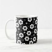 Tasse niedlicher Schwarz-weißer Blume (Links)