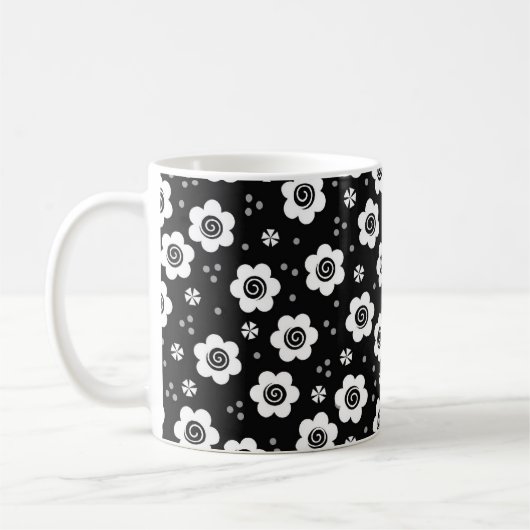 Tasse niedlicher Schwarz-weißer Blume (Links)