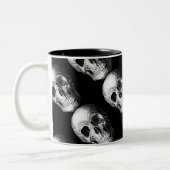 Tasse Schwarz des Gewindelmusters (Links)