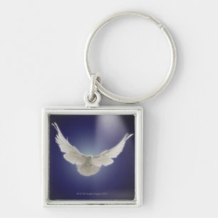 Taubenfliegen durch Lichtstrahl Schlüsselanhänger