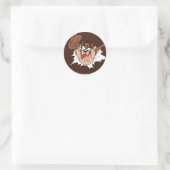 TAZ™ Burning Through Page Runder Aufkleber (Tasche)