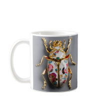 TAZA DE COLOR BLANCO CON IMPRESION DE ESCARABAJO