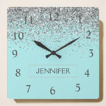 Teal Aqua Blue Silver Glitter Girly Monogram Name Quadratische Wanduhr<br><div class="desc">Teal Aqua Blue and Silver Sparkle Glitter Monogram Name Clock. This makes the perfect sweet 16 birthday,  wedding,  bridal shower,  anniversary,  baby shower or bachelorette party gift for someone that loves glam luxury and chic styles.</div>