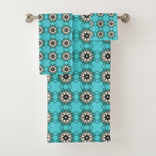  teal towels featuring a black and white geometric badhandtuch set (Insitu)