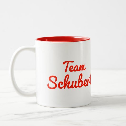 Team Schubert Zweifarbige Tasse (Links)