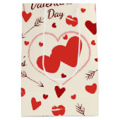 Teddy-Bär mit einem mittelgroßen Herzbeutel Mittlere Geschenktüte (Rückseite)