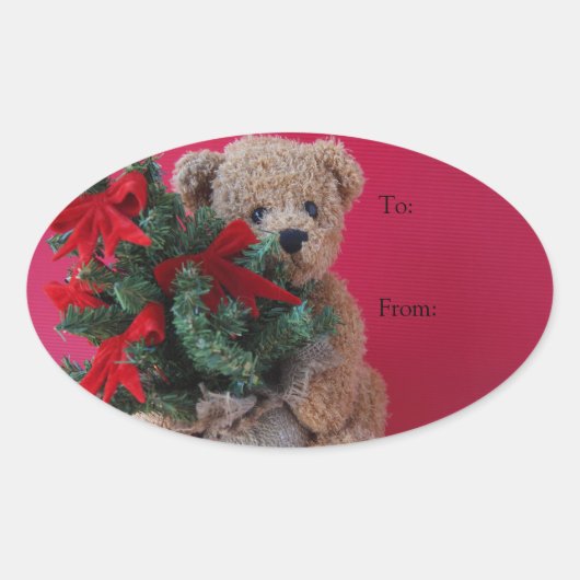 Teddy Bär mit Weihnachtsbaum Ovaler Aufkleber (Vorderseite)