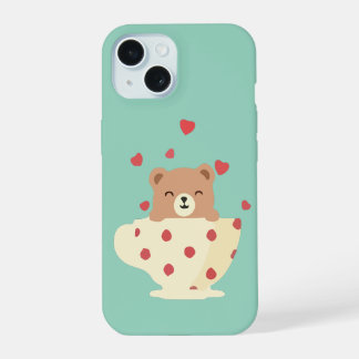 Teddybär mit lächelndem Gesicht in einer Tasse mit iPhone 15 Hülle
