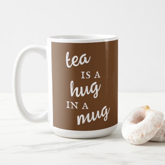 Tee ist ein Schluck in einer Tasse, braun und weiß Kaffeetasse (Mit Donut)