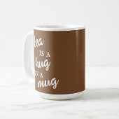 Tee ist ein Schluck in einer Tasse, braun und weiß Kaffeetasse (Vorderseite Links)