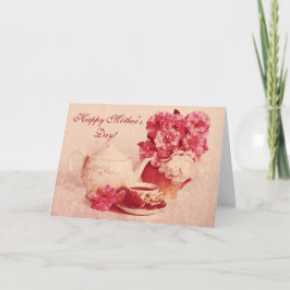Teekanne, eine Tasse Tee und Rose Karte