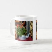 Teekanne gefüllt mit Pelargonien Kaffeetasse (Vorderseite Links)