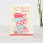 Teekuppen und Rose, Happy Birthday Sister Karte<br><div class="desc">Feiern Sie mit dieser hübschen Karte einen besonderen Geburtstag der Schwester mit einem Set Teebecher in Blume,  Polka Dot und Gingham-Muster,  rosa Rosen und einem Kuchen mit rosa Polka Dots Herzklopfen. Hintergrund ist Creme mit einem Korallenrandstreifen. Graphics©MyClipartStore</div>