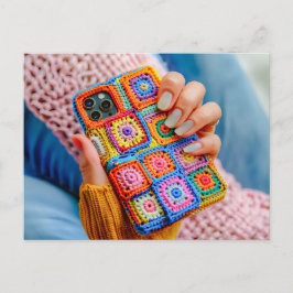 Teen Holding a Crocheted Phone Case Made From Gran Postkarte