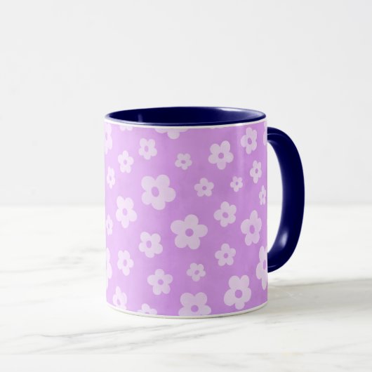 Teetasse aus lila und weißen Blume mit blauem Grif (VorderseiteRechts)