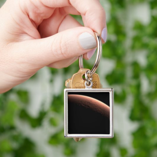 Teil der Mars an der Grenze von Licht und Dunkel. Schlüsselanhänger (Hand)