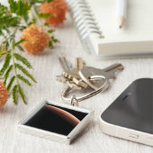 Teil der Mars an der Grenze von Licht und Dunkel. Schlüsselanhänger (Seite)