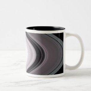 Teilchen in SaturnÃ¯Â ¿ Â ½ s schellt Zweifarbige Tasse