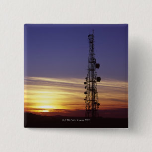 Telekommunikation bemastet am Sonnenuntergang Button