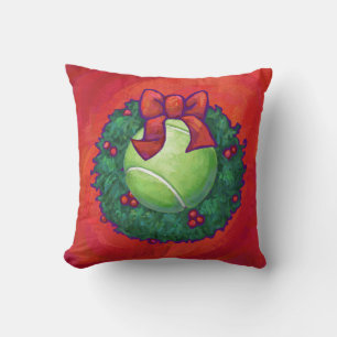 Tennis Ball in Wreath auf Rot Kissen