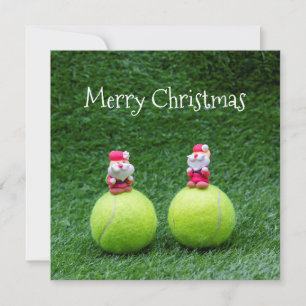 Tennisball mit Weihnachtsfeiertag des Weihnachtsma
