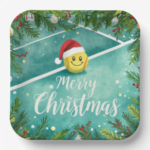 Tennisball mit Weihnachtsmannmütze auf dem Platz W Pappteller