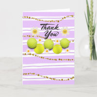 Tennisball mit weißer, dunkler Blume Danke