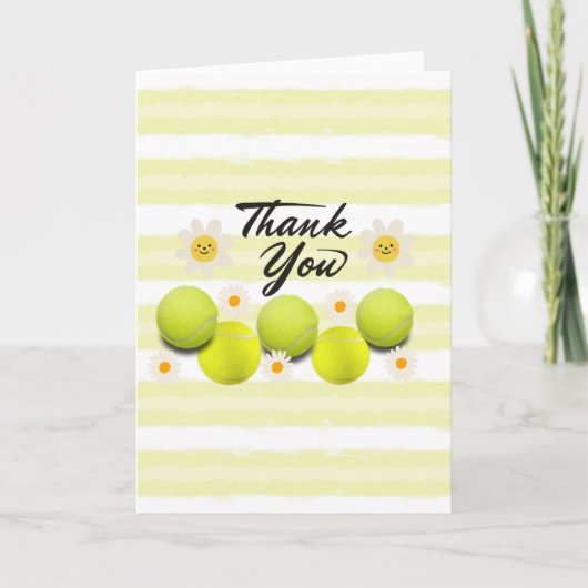 Tennisball mit weißer, dunkler Blume Danke (Vorderseite)