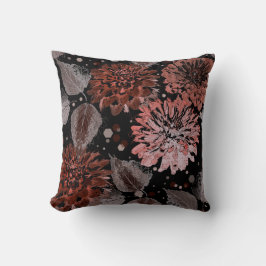 Terracotta-Blume mit grauen Blätter auf schwarz Kissen