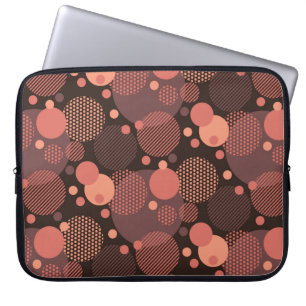 Terracotta-Schokoladenfarben rund um Bausteine nah Laptopschutzhülle