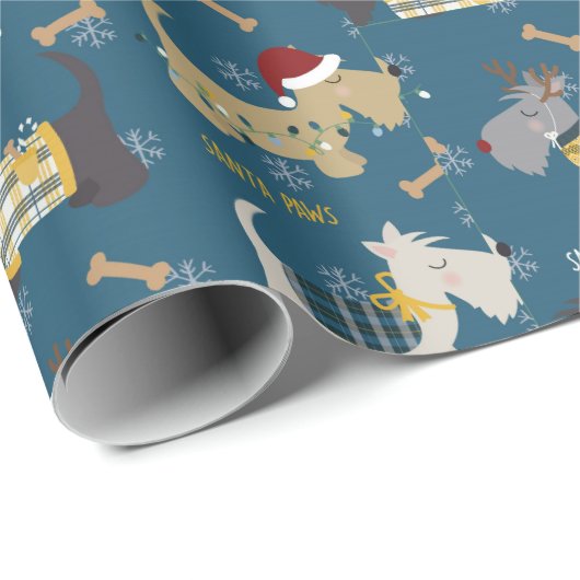Terrier Hunde in Weihnachtshüten auf blau Geschenkpapier (Rolleneckpunkt)