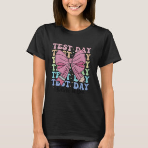 Testtag Ich glaube an dich Kokette Schleife Lehrer T-Shirt