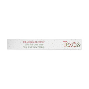 Texas-Musterbuchstaben und Weihnachtsstern-Kranz