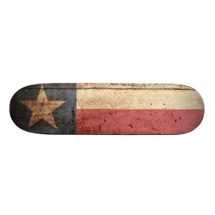 Texas-Staats-Flagge auf altem hölzernem Korn Skateboard
