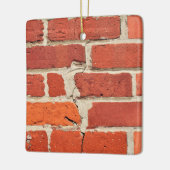 Textierte und gerissene rote Ziegelmauer Keramikornament (Links)