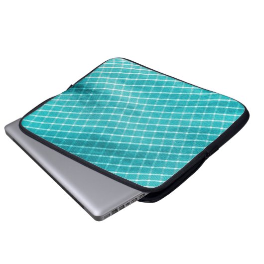 Textilverschluss im Hintergrund. Laptopschutzhülle (Vorne Knopf)