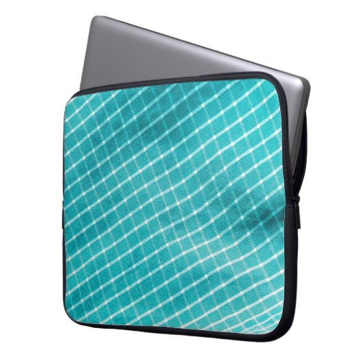 Textilverschluss im Hintergrund. Laptopschutzhülle (Vorderseite Links)