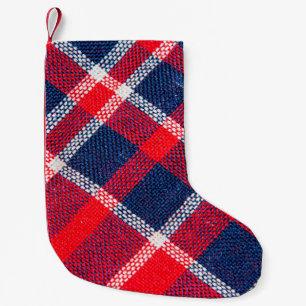 Textur aus Rot und Blau, aus karierten Wolle Kleiner Weihnachtsstrumpf