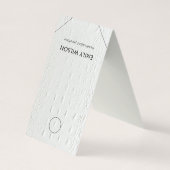 Textur aus weißem Leder, die an der Netzklammer hä Visitenkarten (Rückseite)