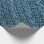 Textur des Strickstoffes, hellblaues Colo Geschenkpapier (Ecke)