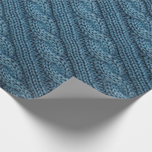 Textur des Strickstoffes, hellblaues Colo Geschenkpapier (Ecke)