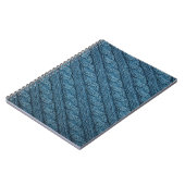 Textur des Strickstoffes, hellblaues Colo Notizblock (Linke Seite)