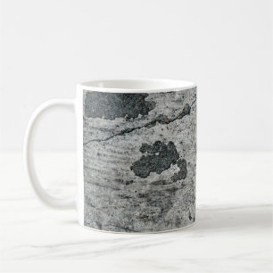 Textur einer alten gebrochenen Betonwand. Hintergr Kaffeetasse