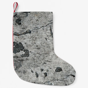 Textur einer alten rissigen Betonwand. Hintergrund Kleiner Weihnachtsstrumpf
