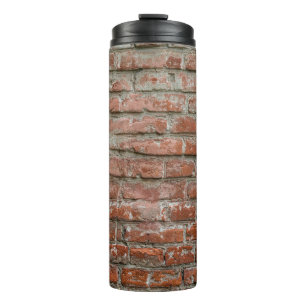 Textur. Ziegel. Wand. Ein Hintergrund mit Attribut Thermosbecher