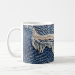 Texturen reißen Jeans Hintergrund. Kaffeetasse