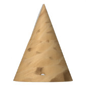 Texturierte gelbe Wüste Sand Hintergrund. Partyhütchen (Links)