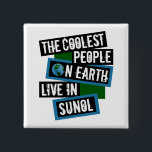 The Coolest People on Earth Live in Sunol Button<br><div class="desc">This design features bold, layered text with the phrase "The Coolest People on Earth Live in Sunol" in a striking cool color palette. A globe graphic, integrated with coordinating blue and green blocks, symbolizes the city's global appeal. The design is suitable for showcasing local pride, as it boldly declares Sunol's...</div>